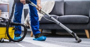 A man doing carpet cleaning